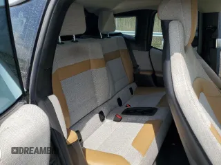 2014 BMW i3 z VIN WBY1Z2C5XEVX51161, wystawiony jako Copart lot #55044855 z przebiegiem 71 232 mil mil oraz Czysty tytuł • Clean title. Historia ofert i sprzedaży dostępna na DreamBid. Obrazek 10.