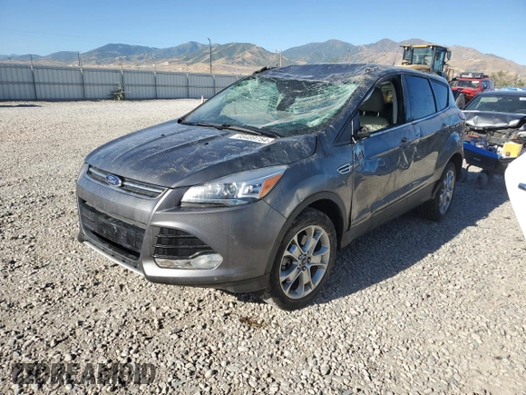 2014 Ford Escape Titanium with VIN 1FMCU9J90EUD94405, listed as a Copart auction lot 68489754 with 52,045 mi miles and Salvage Title. Bid and sale history available at DreamBid. Image 1.