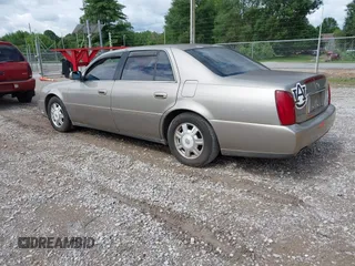 2003 Cadillac DeVille z VIN 1G6KD54Y73U130593, wystawiony jako IAAI lot #42377235 z przebiegiem 133 656 mil mil oraz . Historia ofert i sprzedaży dostępna na DreamBid. Obrazek 3.