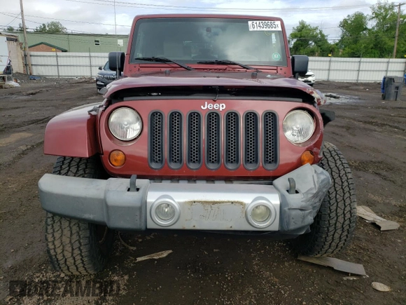2008 Jeep Wrangler Sahara with VIN 1J4FA54178L566037, listed as a Copart auction lot 61439685 with 115,812 mi miles and Salvage title. Bid and sale history available at DreamBid. Image 5.