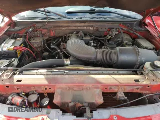 2000 Ford F-150 XL with VIN 1FTRX18W6YNC32005, listed as a Copart auction lot 82169314 with 289,320 mi miles and Salvage Title. Bid and sale history available at carsss.com. Image 12.