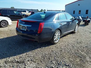 2016 Cadillac XTS Luxury Collection with VIN 2G61M5S37G9123956, listed as a IAAI auction lot 42421872 with 107,586 mi miles and . Bid and sale history available at DreamBid. Image 4.