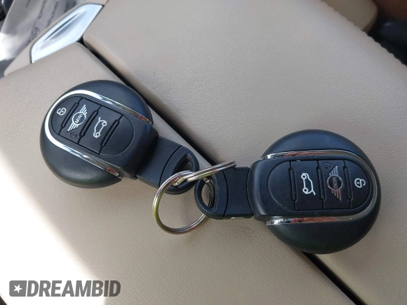 2021 MINI Convertible Cooper S z VIN WMWWJ5C0XM3M08622, wystawiony jako IAAI lot #42507679 z przebiegiem 36 932 mil mil oraz . Historia ofert i sprzedaży dostępna na DreamBid. Obrazek 11.