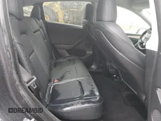 2024 Tesla Model Y z VIN 7SAYGDEDXRF076893, wystawiony jako Copart lot #57966515 z przebiegiem 9 200 mil mil oraz Szkoda całkowita • Salvage title. Historia ofert i sprzedaży dostępna na DreamBid. Obrazek 11.