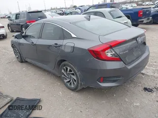 2018 Honda Civic EX with VIN 2HGFC2F79JH570403, listed as a IAAI auction lot 42018123 with 165,821 mi miles and . Bid and sale history available at DreamBid. Image 3.