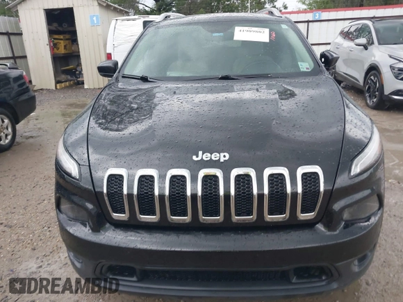 2016 Jeep Cherokee Latitude with VIN 1C4PJLCS4GW347185, listed as a IAAI auction lot 41909802 with 155,026 mi miles. Bid and sale history available at carsss.com. Image 12.