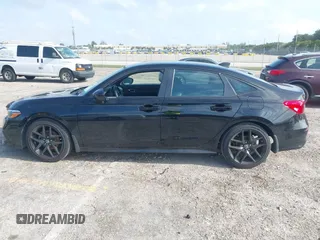 2024 Honda Civic Sport z VIN 2HGFE2F52RH596586, wystawiony jako IAAI lot #42008964 z przebiegiem 7 831 mil mil oraz . Historia ofert i sprzedaży dostępna na DreamBid. Obrazek 14.