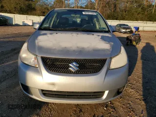 2012 Suzuki SX4 LE with VIN JS2YC5A38C6300439, listed as a Copart auction lot 85121124 with 74,324 mi miles and Clean Title. Bid and sale history available at carsss.com. Image 5.