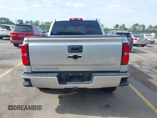 2017 Chevrolet Silverado 1500 LT with VIN 3GCUKREC5HG285689, listed as a IAAI auction lot 42055959 with 128,237 mi miles and . Bid and sale history available at DreamBid. Image 16.