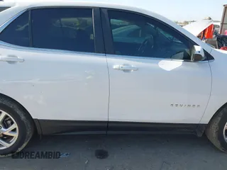 2021 Chevrolet Equinox LT with VIN 3GNAXKEV1ML351581, listed as a IAAI auction lot 41764202 with 71,547 mi miles and . Bid and sale history available at DreamBid. Image 13.
