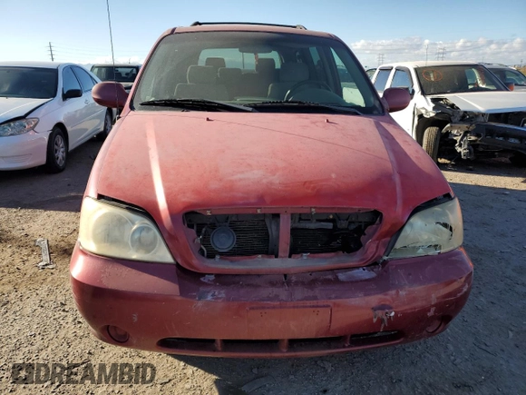 2005 Kia Sedona LX with VIN KNDUP132156669009, listed as a Copart auction lot 76936094 with 124,989 mi miles and Salvage Title. Bid and sale history available at carsss.com. Image 5.