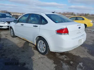 2008 Ford Focus S with VIN 1FAHP34N98W264337, listed as a IAAI auction lot 41414660 with 151,938 mi miles. Bid and sale history available at carsss.com. Image 3.