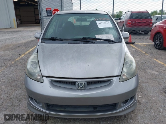 2007 Honda Fit Sport with VIN JHMGD37697S040265, listed as a IAAI auction lot 42130310 with 127,906 mi miles. Bid and sale history available at carsss.com. Image 6.