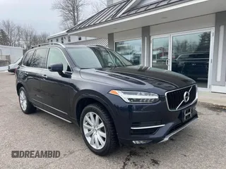 2017 Volvo XC90 Momentum with VIN YV4A22PK4H1122879, listed as a IAAI auction lot 41604685 with 164,460 mi miles. Bid and sale history available at carsss.com. Image 1.