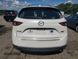 2018 Mazda CX-5 Grand Touring с VIN JM3KFADM3J1351532, выставлен на аукционе Copart как лот 55567405 с пробегом 99 134 миль миль и Списание • Salvage title. История ставок и продаж доступна на DreamBid. Изображение 6.
