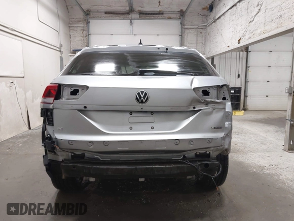 2023 Volkswagen Atlas SE z VIN 1V2KC2CA6PC210593, wystawiony jako IAAI lot #41957633 z przebiegiem 34 801 mil mil oraz . Historia ofert i sprzedaży dostępna na DreamBid. Obrazek 17.