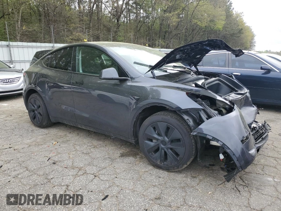 2024 Tesla Model Y Long Range z VIN 7SAYGDEE9RA293776, wystawiony jako Copart lot #51289225 z przebiegiem 12 990 mil mil oraz Szkoda całkowita • Salvage title. Historia ofert i sprzedaży dostępna na DreamBid. Obrazek 4.