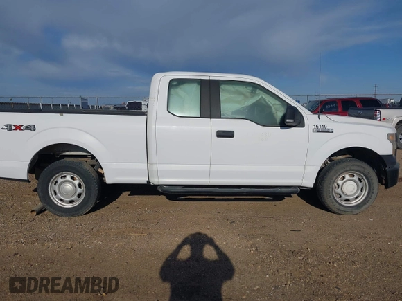 2016 Ford F-150 XLT with VIN 1FTFX1EF6GKF56188, listed as a IAAI auction lot 42022765 with 218,553 mi miles. Bid and sale history available at carsss.com. Image 14.