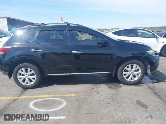 2012 Nissan Murano S with VIN JN8AZ1MU6CW121666, listed as a IAAI auction lot 41911631 with 114,851 mi miles and . Bid and sale history available at carsss.com. Image 13.