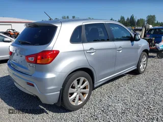2012 Mitsubishi Outlander SE with VIN JA4AR4AU9CZ006957, listed as a IAAI auction lot 42414611 with 188,439 mi miles and . Bid and sale history available at DreamBid. Image 4.
