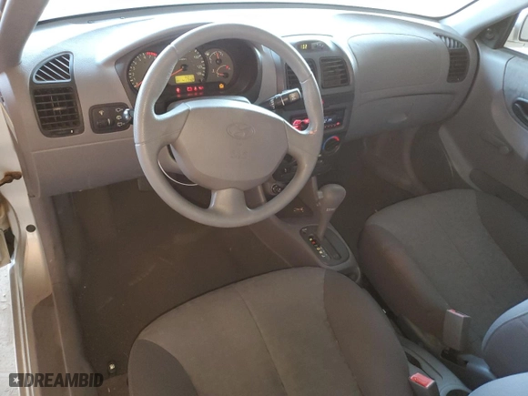 2004 Hyundai Accent GL with VIN KMHCG35CX4U283952, listed as a Copart auction lot 73587124 with 41,742 mi miles and Salvage Title. Bid and sale history available at carsss.com. Image 8.