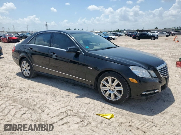 2012 Mercedes-Benz E 350 Luxury with VIN WDDHF5KB0CA642851, listed as a Copart auction lot 61457885 with 117,036 mi miles and Salvage title. Bid and sale history available at DreamBid. Image 4.