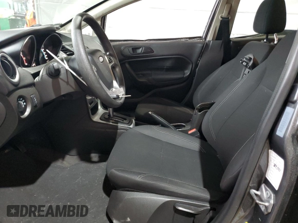 2019 Ford Fiesta SE z VIN 3FADP4BJ5KM124183, wystawiony jako Copart lot #53210525 z przebiegiem 77 120 mil mil oraz Szkoda całkowita • Salvage title. Historia ofert i sprzedaży dostępna na DreamBid. Obrazek 7.