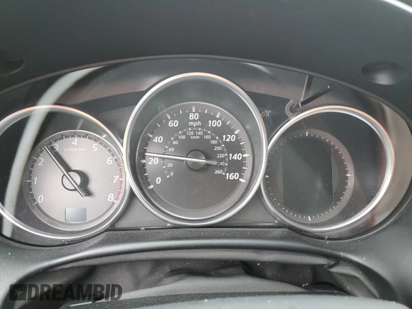 2014 Mazda CX-5 Touring z VIN JM3KE4CYXE0426408, wystawiony jako Copart lot #57355115 z przebiegiem Nie podano mil oraz Szkody całkowita. Historia ofert i sprzedaży dostępna na DreamBid. Obrazek 9.