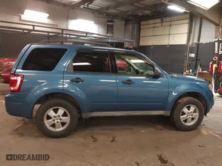 2009 Ford Escape XLT with VIN 1FMCU93G99KB70918, listed as a IAAI auction lot 41942399 with 141,158 mi miles. Bid and sale history available at carsss.com. Image 13.