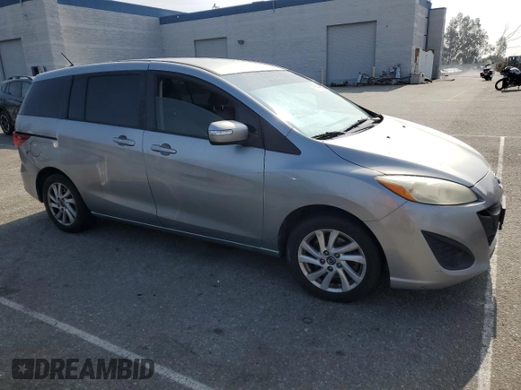 2014 Mazda 5 Sport with VIN JM1CW2BL2E0165103, listed as a Copart auction lot 60730855 with 279,698 mi miles and Clean title. Bid and sale history available at DreamBid. Image 4.
