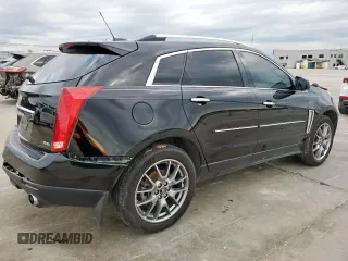 2015 Cadillac SRX Premium Collection z VIN 3GYFNDE33FS574125, wystawiony jako Copart lot #55530575 z przebiegiem 76 956 mil mil oraz Szkoda całkowita • Salvage title. Historia ofert i sprzedaży dostępna na DreamBid. Obrazek 3.