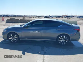 2020 Nissan Altima SR z VIN 1N4BL4CV9LC278578, wystawiony jako IAAI lot #41761814 z przebiegiem 76 453 mil mil oraz . Historia ofert i sprzedaży dostępna na DreamBid. Obrazek 14.