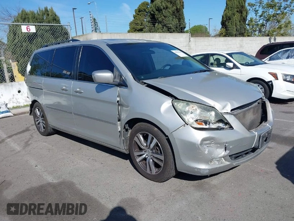 2005 Honda Odyssey TOURING with VIN 5FNRL38865B128519, listed as a IAAI auction lot 41830182 with 171,010 mi miles. Bid and sale history available at carsss.com. Image 1.