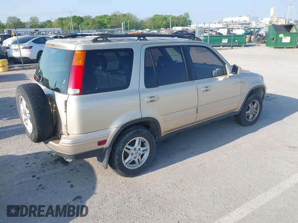 2000 Honda CR-V SE with VIN JHLRD1878YC048555, listed as a IAAI auction lot 42123556 with 164,934 mi miles. Bid and sale history available at carsss.com. Image 4.