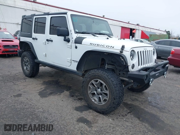 2014 Jeep Wrangler Unlimited Rubicon with VIN 1C4BJWFGXEL283929, listed as a IAAI auction lot 41812052 with 137,790 mi miles and . Bid and sale history available at DreamBid. Image 1.