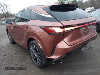 2023 Lexus RX 350h with VIN 2T2BBMCAXPC018936, listed as a IAAI auction lot 41027968 with 20,669 mi miles and . Bid and sale history available at DreamBid. Image 3.