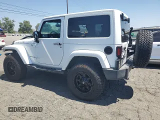 2015 Jeep Wrangler Rubicon Hard Rock z VIN 1C4BJWCG5FL561397, wystawiony jako Copart lot #61218185 z przebiegiem 164 240 mil mil oraz Czysty tytuł • Clean title. Historia ofert i sprzedaży dostępna na DreamBid. Obrazek 2.