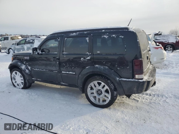 2011 Dodge Nitro Heat with VIN 1D4PU4GX2BW501410, listed as a Copart auction lot 41743945 with 174,235 mi miles and Clean Title. Bid and sale history available at DreamBid. Image 2.