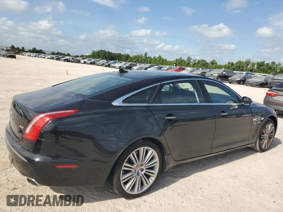 2014 Jaguar XJ with VIN SAJWA2GT0EMV61531, listed as a Copart auction lot 61071054 with 79,266 mi miles and Clean Title. Bid and sale history available at DreamBid. Image 3.