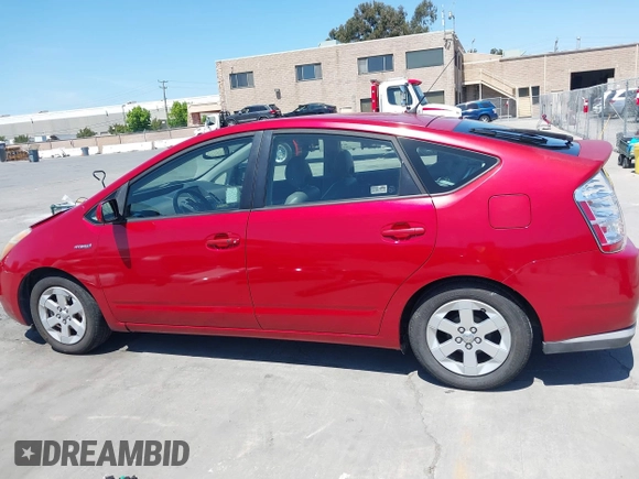 2007 Toyota Prius z VIN JTDKB20U373288946, wystawiony jako IAAI lot #42385536 z przebiegiem 133 336 mil mil oraz . Historia ofert i sprzedaży dostępna na DreamBid. Obrazek 14.