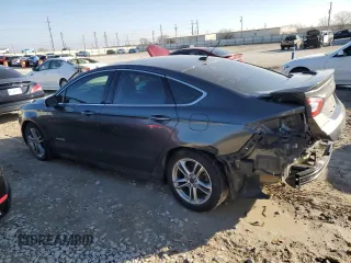 2016 Ford Fusion Titanium Hybrid with VIN 3FA6P0RU9GR289892, listed as a Copart auction lot 42735125 with 82,386 mi miles and Salvage Title. Bid and sale history available at carsss.com. Image 2.