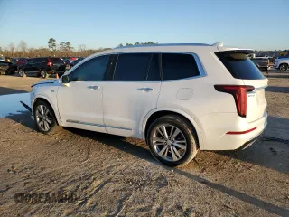 2023 Cadillac XT6 FWD Premium Luxury z VIN 1GYKPCRS5PZ120905, wystawiony jako Copart lot #48533775 z przebiegiem 30 694 mil mil oraz Szkoda całkowita • Salvage title. Historia ofert i sprzedaży dostępna na DreamBid. Obrazek 2.