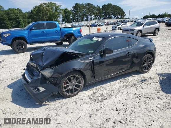 2014 Scion FR-S z VIN JF1ZNAA1XE8707871, wystawiony jako Copart lot #57945695 z przebiegiem 140 517 mil mil oraz Czysty tytuł • Clean title. Historia ofert i sprzedaży dostępna na DreamBid. Obrazek 1.