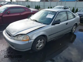 1998 Honda Civic DX with VIN 1HGEJ6221WL134982, listed as a IAAI auction lot 41904339 with 245,496 mi miles. Bid and sale history available at carsss.com. Image 2.