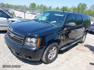 2007 Chevrolet Suburban LT with VIN 3GNFC16J27G262235, listed as a IAAI auction lot 41980553 with 144,926 mi miles. Bid and sale history available at carsss.com. Image 2.