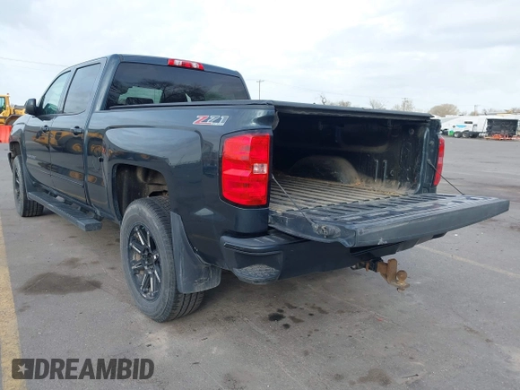 2017 Chevrolet Silverado 1500 LT with VIN 3GCUKREC7HG220780, listed as a IAAI auction lot 41978463 with 131,532 mi miles and . Bid and sale history available at DreamBid. Image 3.