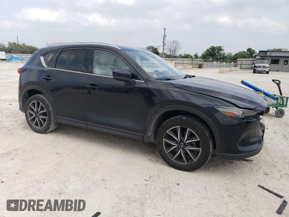 2017 Mazda CX-5 Grand Touring with VIN JM3KFADL0H0217505, listed as a Copart auction lot 50470735 with 176,878 mi miles and Salvage Title. Bid and sale history available at carsss.com. Image 4.