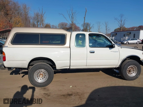 1998 Toyota Tacoma with VIN 4TAWN72N3WZ103586, listed as a IAAI auction lot 40908635 with 197,024 mi miles and . Bid and sale history available at DreamBid. Image 13.