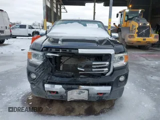 2015 GMC Canyon 4WD SLT with VIN 1GTG6CE39F1202730, listed as a IAAI auction lot 41510275 with 114,444 mi miles. Bid and sale history available at carsss.com. Image 13.