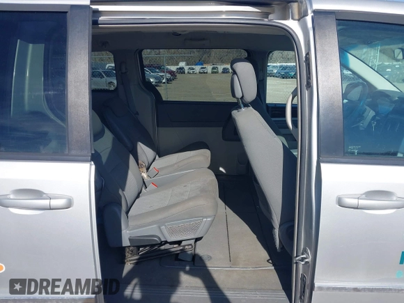 2010 Dodge Grand Caravan SXT with VIN 2D4RN5D19AR406197, listed as a IAAI auction lot 41854505 with 140,760 mi miles and . Bid and sale history available at DreamBid. Image 8.